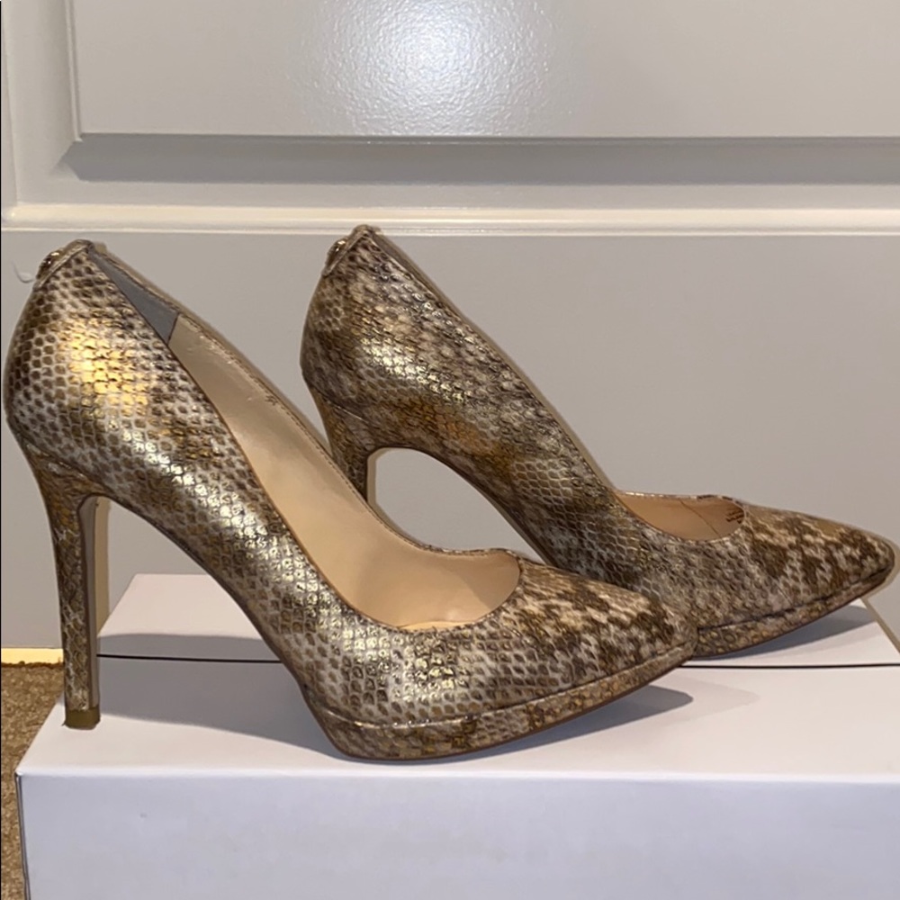 Ivanka Trump snake skin pointed toe heels